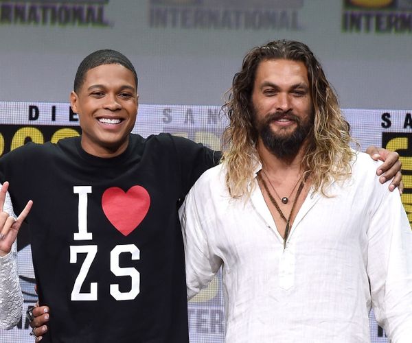 Jason Momoa stands with Ray Fisher