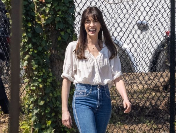 Anne Hathaway is outside, too