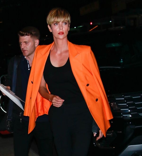 Charlize Theron: great hair, great pants, trailer coming?