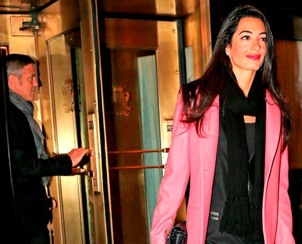 George & Amal back after holiday