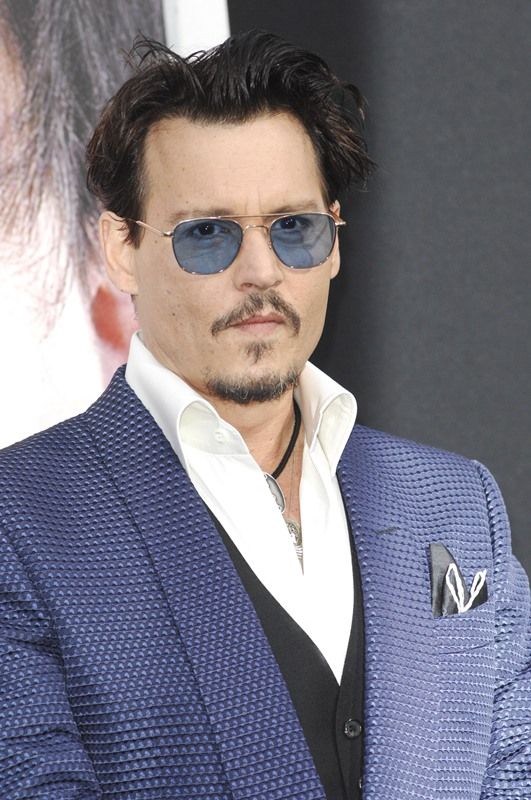 Johnny Depp talks about elephants instead