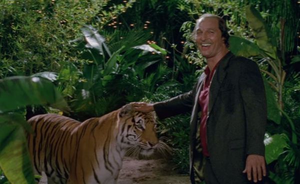 Matthew McConaughey is touching a tiger