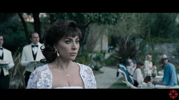 Lady Gaga taps her tiny spoon