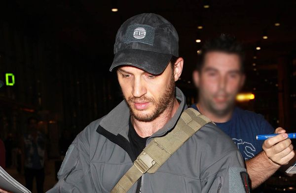 Tom Hardy just tends bar…and a puppy