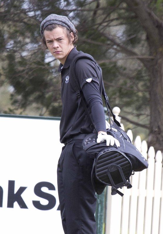 Harry carries his own bag