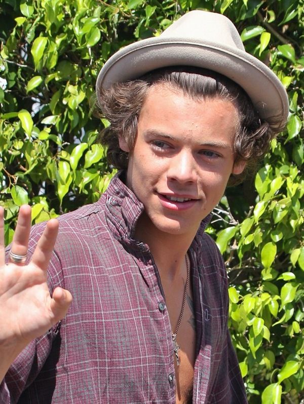 Harry’s tanned in the face