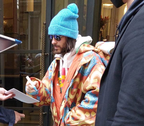 Who is the ACTOR and ARTIST in a blue hat?