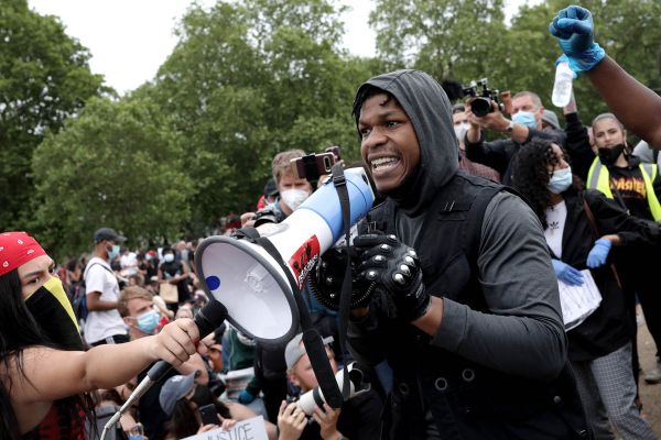John Boyega marches in London