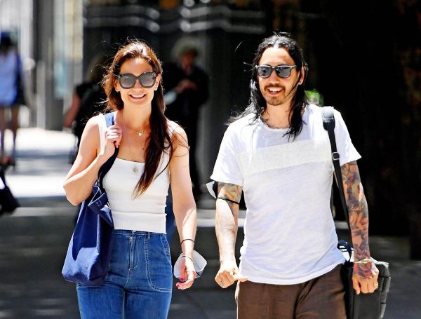 Katie walks with a friend