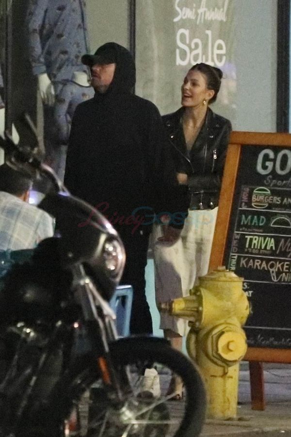 Leo and Camila holding hands