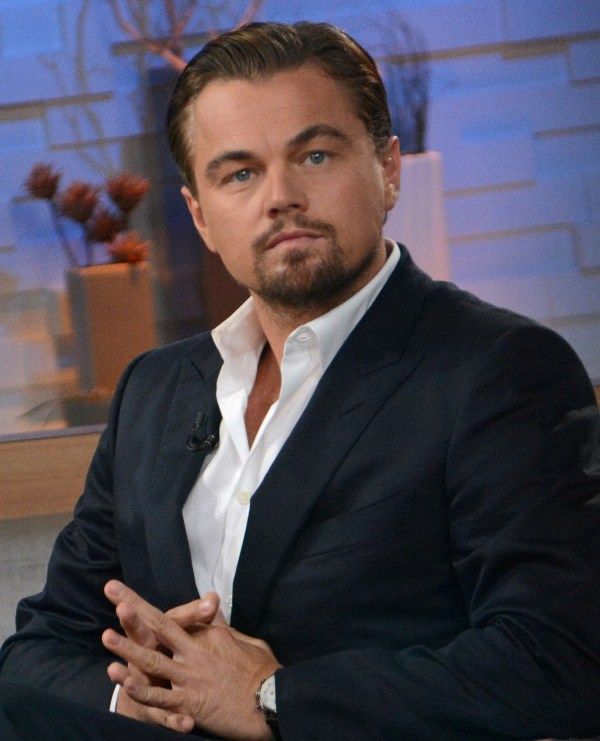 Leo & Gisele on opposite sides of the room