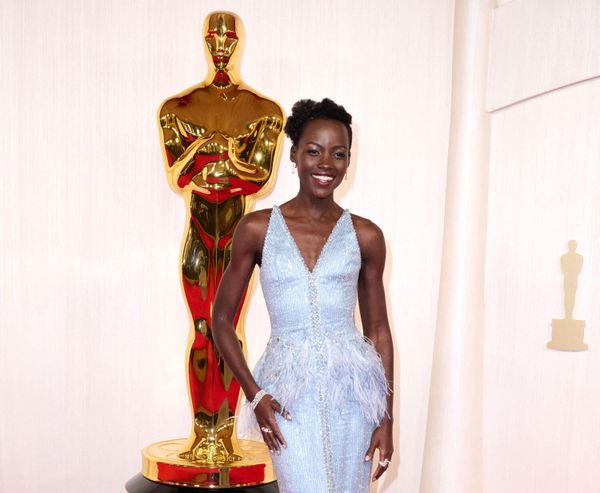 What color is Lupita’s dress?