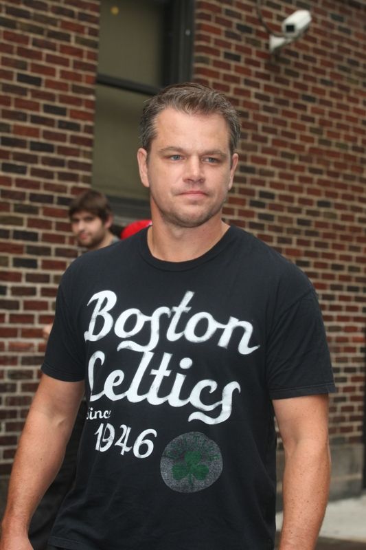Matt Damon with Halle Berry on his lap