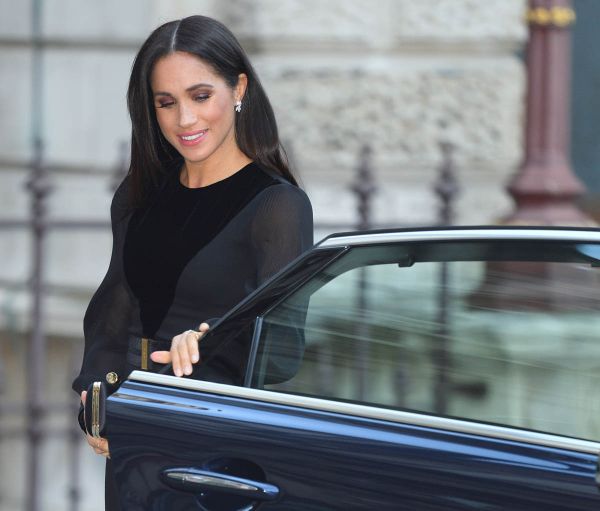 Royal Meghan and the car door
