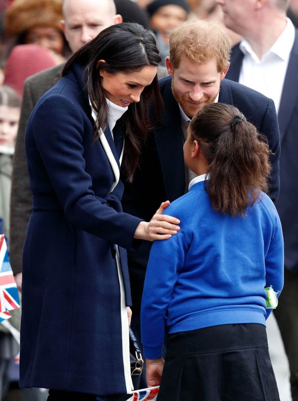 Hugging Meghan Markle