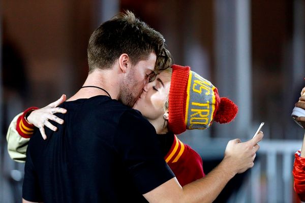 Miley kissing Patrick