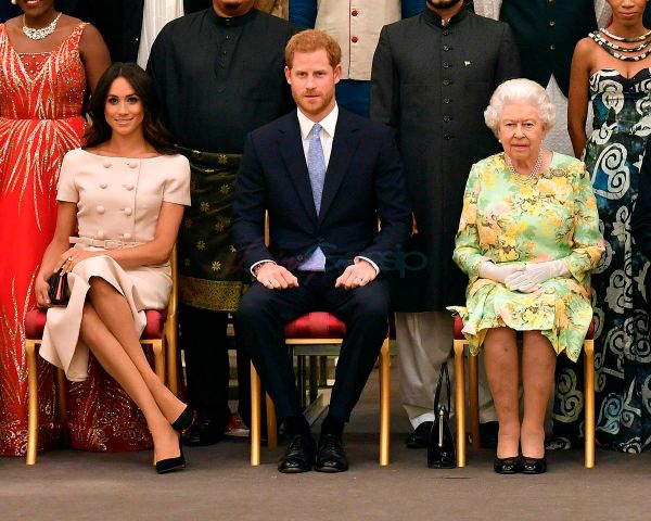 Royal Meghan’s “cross slant”