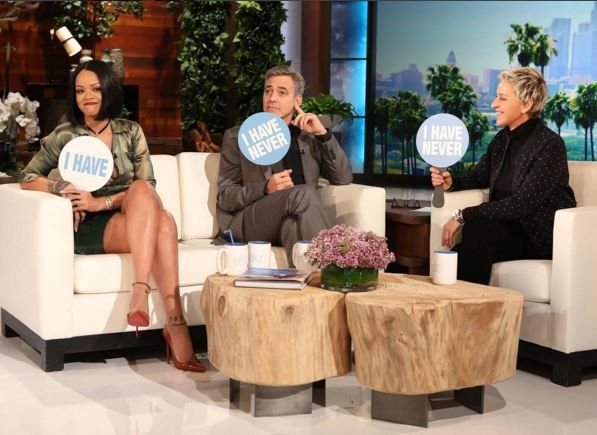 Rihanna plays with George