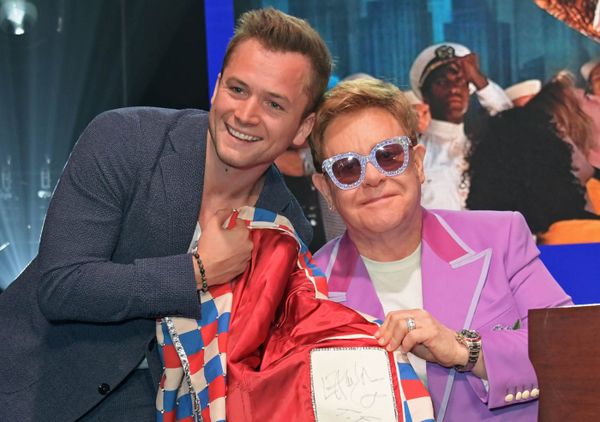Taron Egerton and Elton John won’t let you forget about Rocketman