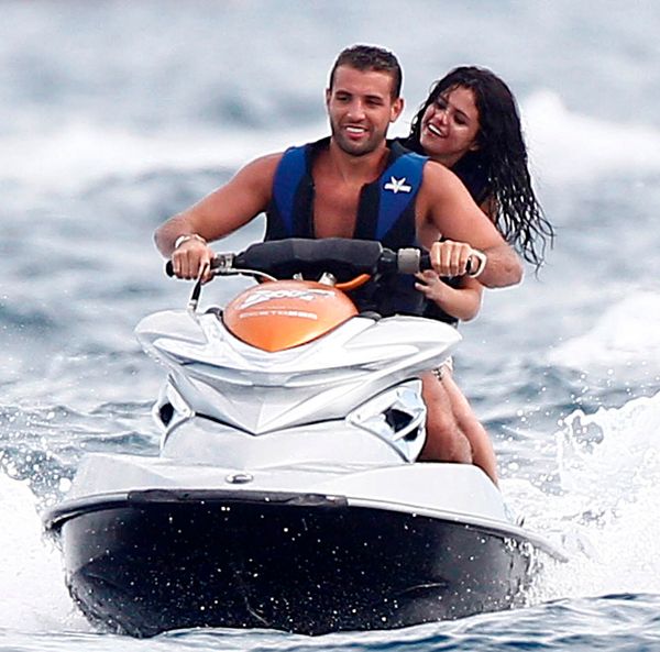 Selena with a cute guy…and Leonardo DiCaprio