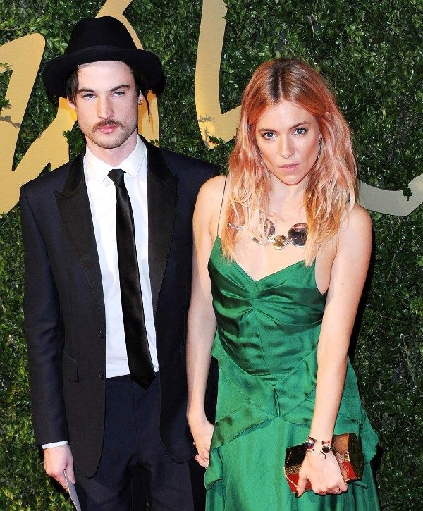 Sienna poses hard in green