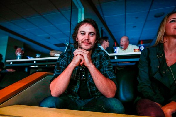 Taylor Kitsch in the hockey box
