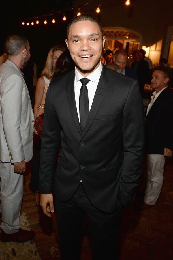 Trevor Noah takes his seat