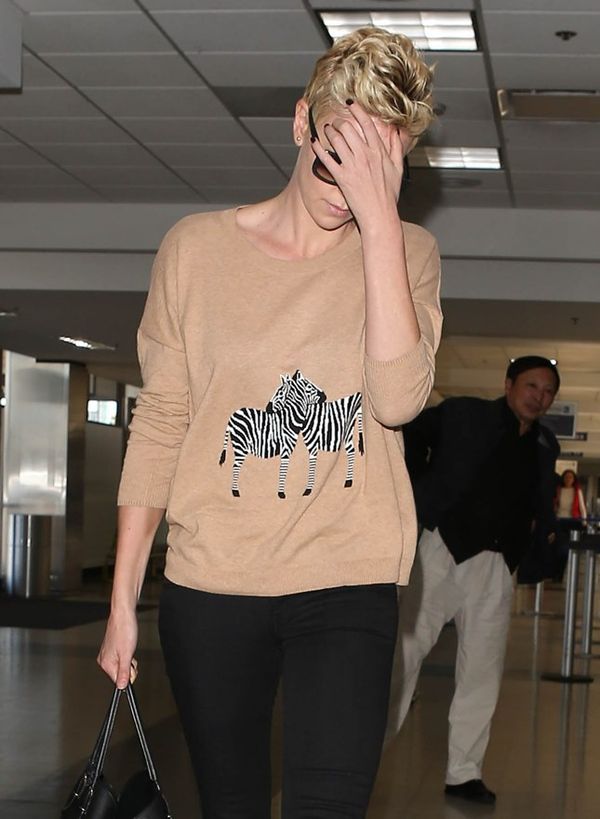 Carpets & Candids: Charlize’s zebra sweater