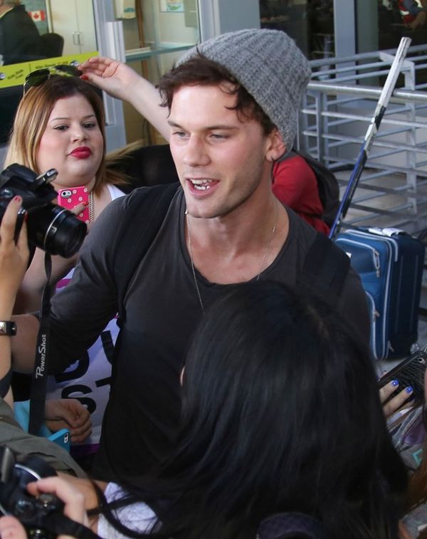 Carpets & Candids: Jeremy Irvine arrives for TIFF