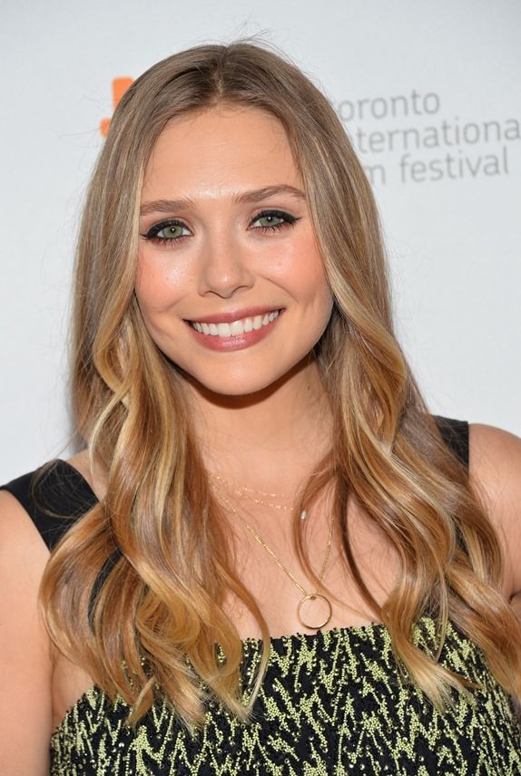 Carpets & Candids: Elizabeth Olsen at the TIFF premiere of 'Therese'