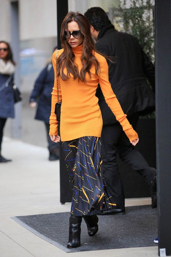 Carpets & Candids: Posh’s orange and pleats