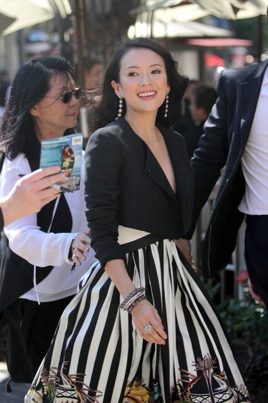 Carpets & Candids: Zhang Ziyi’s stripes and heavy jacket