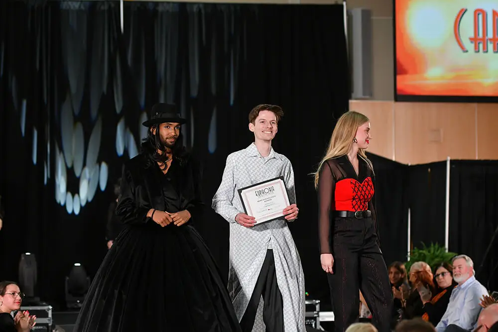 Carson receiving the 'Best Collection - Senior Award' at the Euphora Show