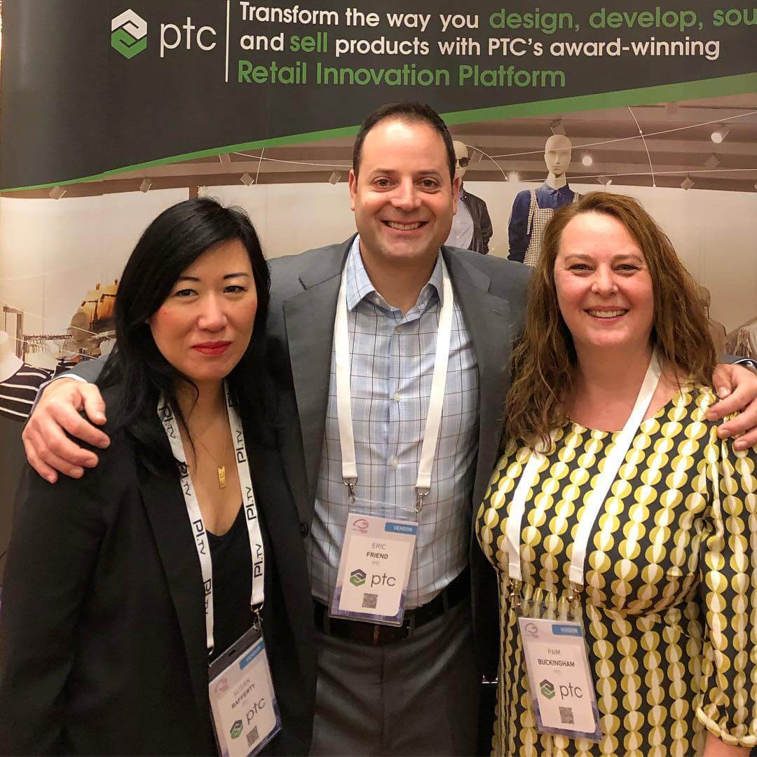 Pam posing with the PTC team in 2019