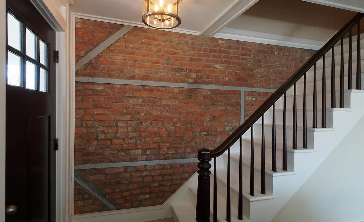 Entry with brick wall