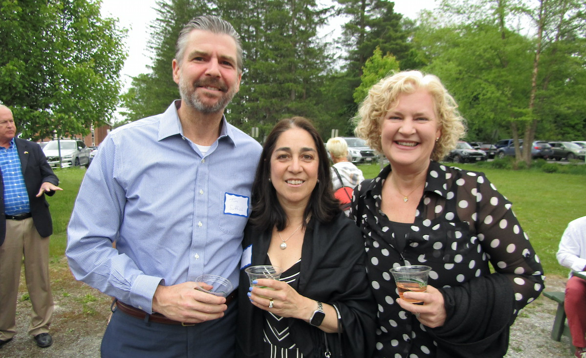 Tim and Anna Suffish pose with Heather Wells Heim