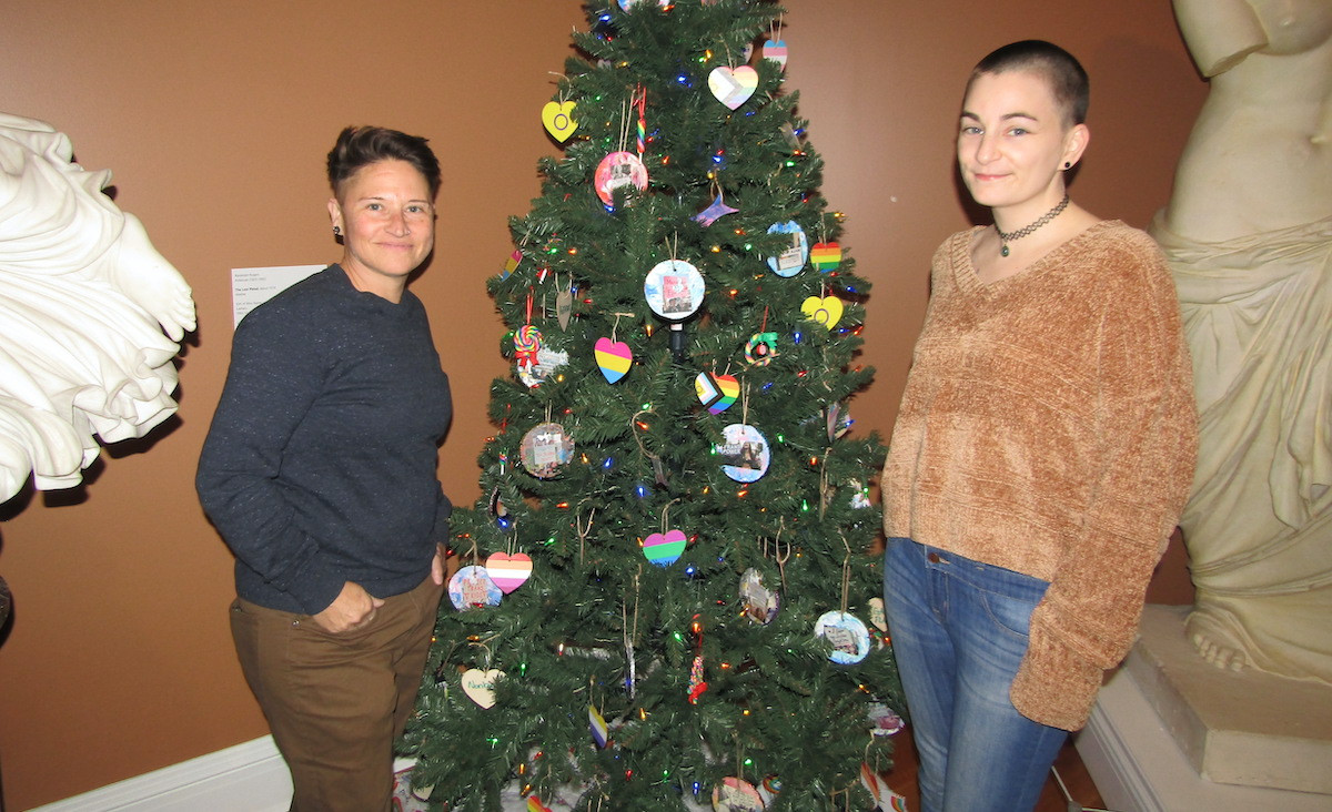 Laurie Lenski and Emma Lenski pose in front of the Berkshire Pride sponsored tree.