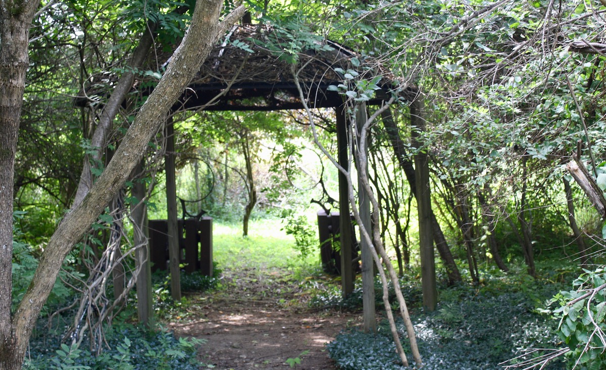 A hidden gazebo made from a giant old satellite dish. A hidden gazebo made from a giant old satellite dish.