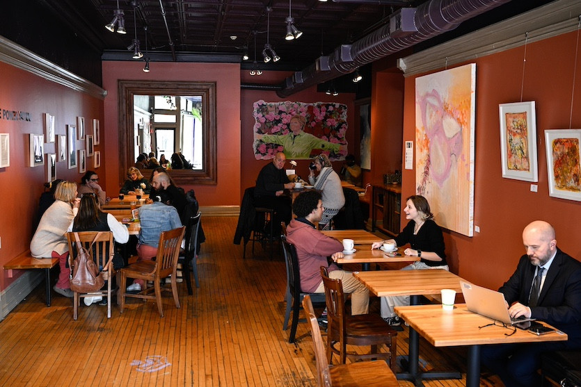 The side dining room at Dottie's, with art for sale on the walls