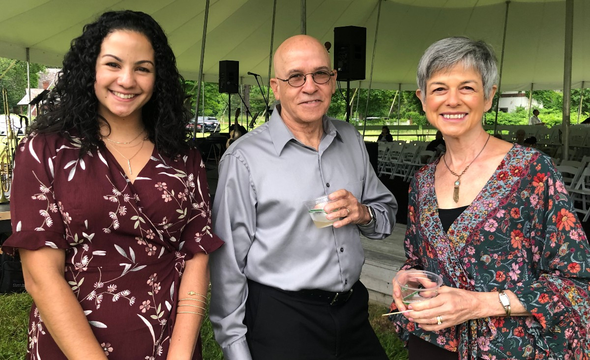 Lorena Dus, director of client and community services (and translator for the evening); with Juan Ramos and Mary Jo Ramos, who is a volunteer translator for BIC