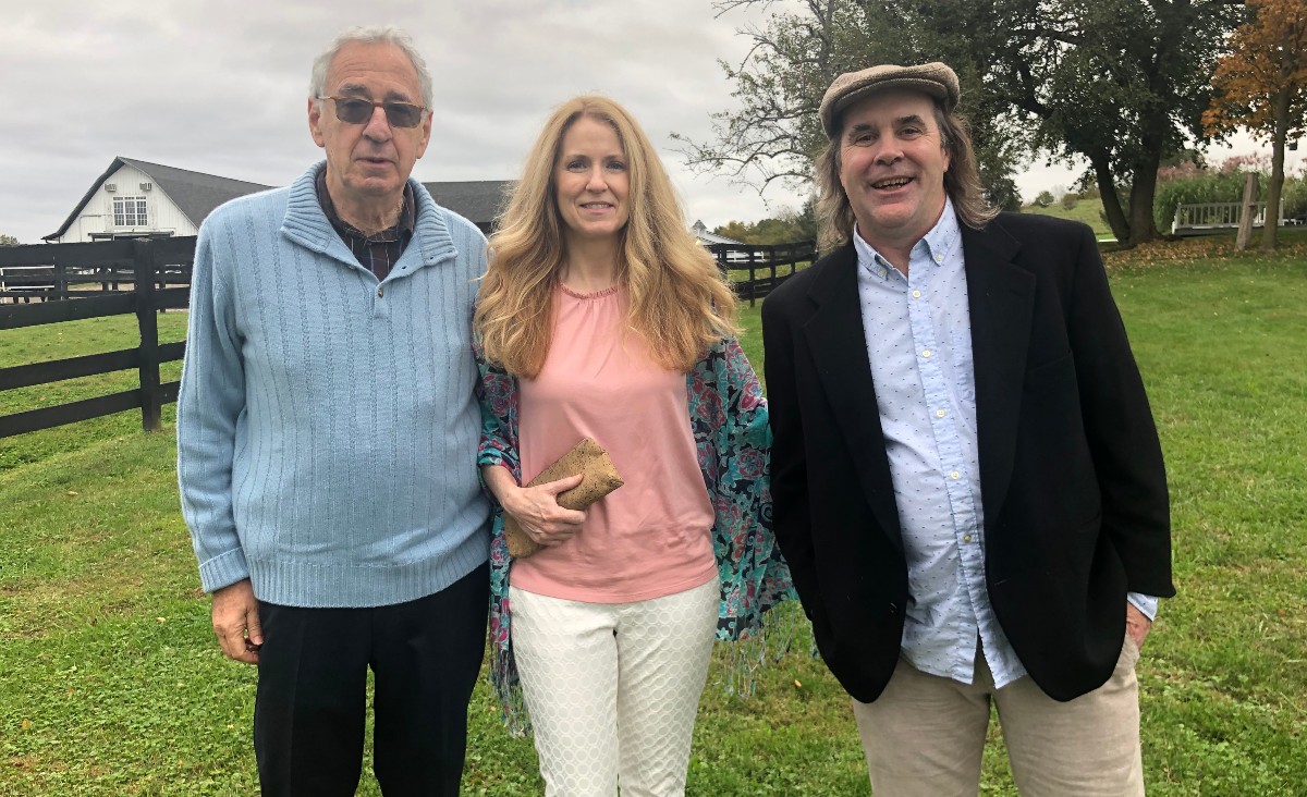Jeffrey Tucker, board chair, with Michelle Deuel and William Deuel, a rock musician from Saratoga Springs