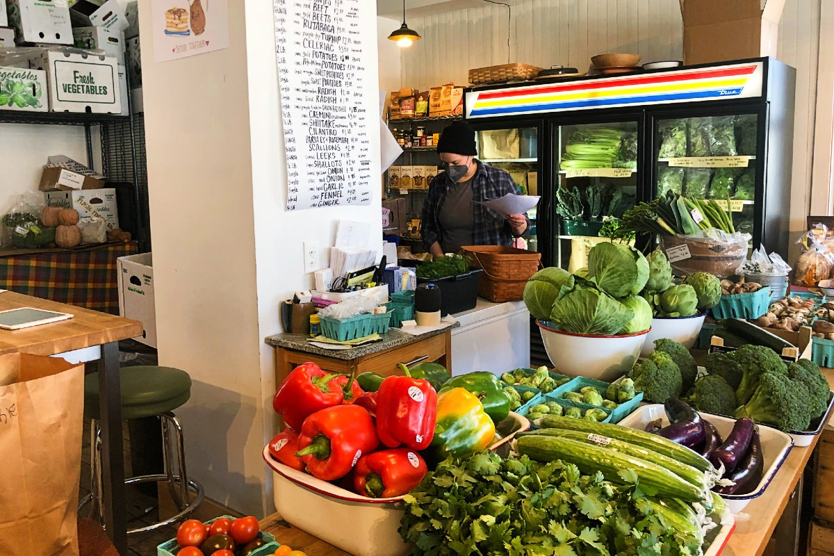 Eleanor Young packs orders for pickup.