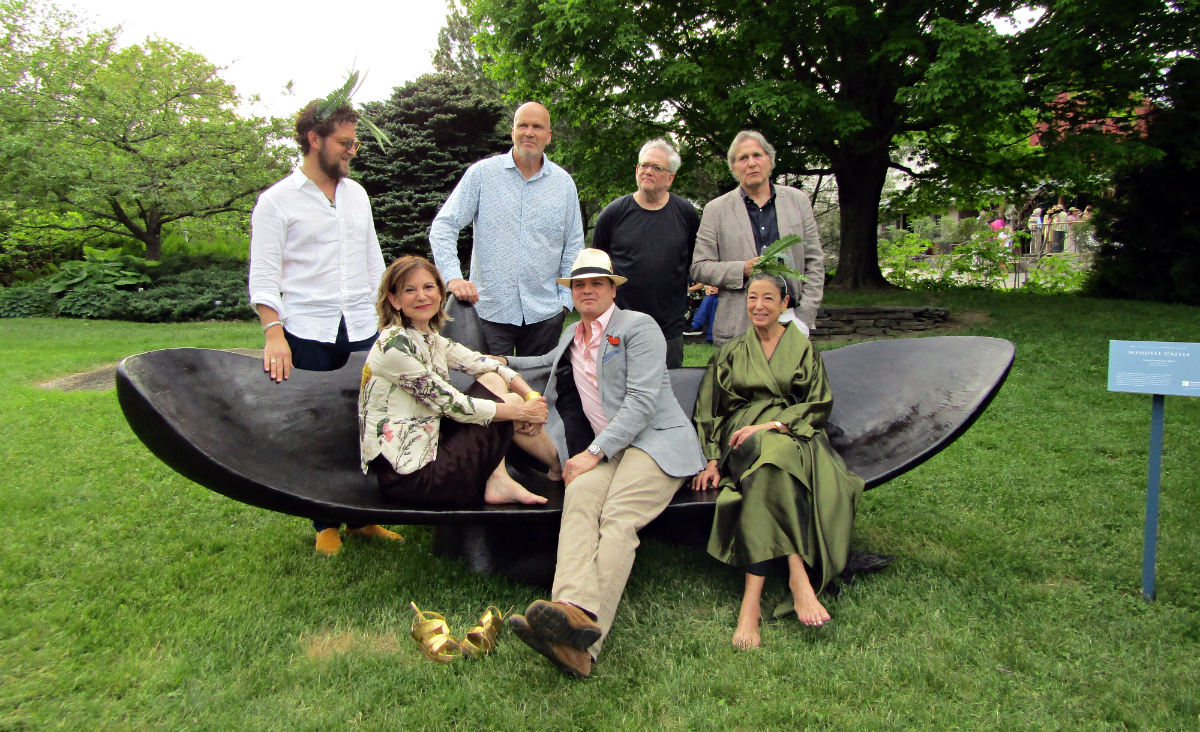 Sculptors featured in the exhibit Beautiful Strangers pose with the late Wendell Castle’s Grand Temptation. L to R standing: Fitzhugh Karol, Mark Mennin, Stephen Talasnik and Ned Smyth. L to R seated: Toni Ross, curator James Salomon and Michele Oka Doner Sculptors featured in the exhibit Beautiful Strangers pose with the late Wendell Castle’s Grand Temptation. L to R standing: Fitzhugh Karol, Mark Mennin, Stephen Talasnik and Ned Smyth. L to R seated: Toni Ross, curator James Salomon and Michele Oka Doner