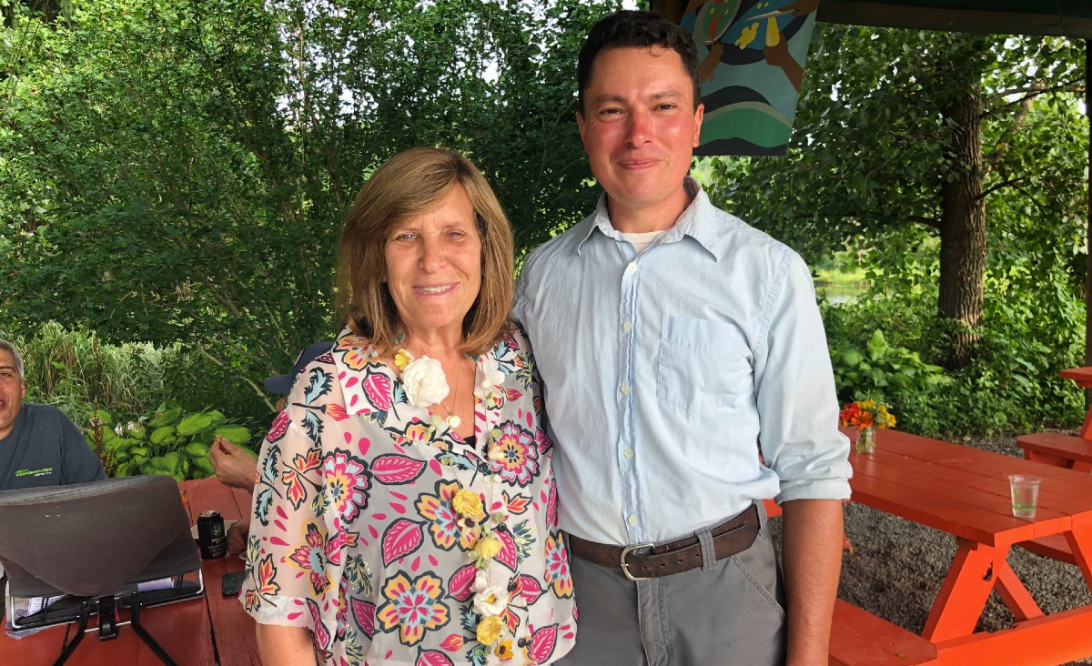 Board member Nina Freedman with "Farmer Jon" Ronsani Board member Nina Freedman with "Farmer Jon" Ronsani