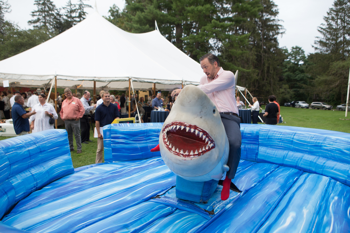 Berkshire Museum Trustee Evan Hickok rides the mechanical shark Berkshire Museum Trustee Evan Hickok rides the mechanical shark