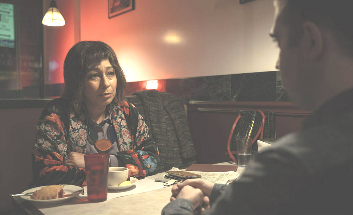 Tamara Tunie and Mark Blane in "Ghost Bike"