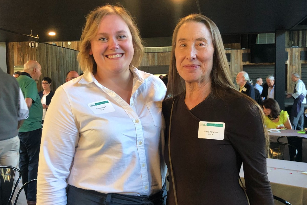 Bailey Girvin, associate director of development at Community Access to the Arts (CATA) and Sandy Newman, CATA founder