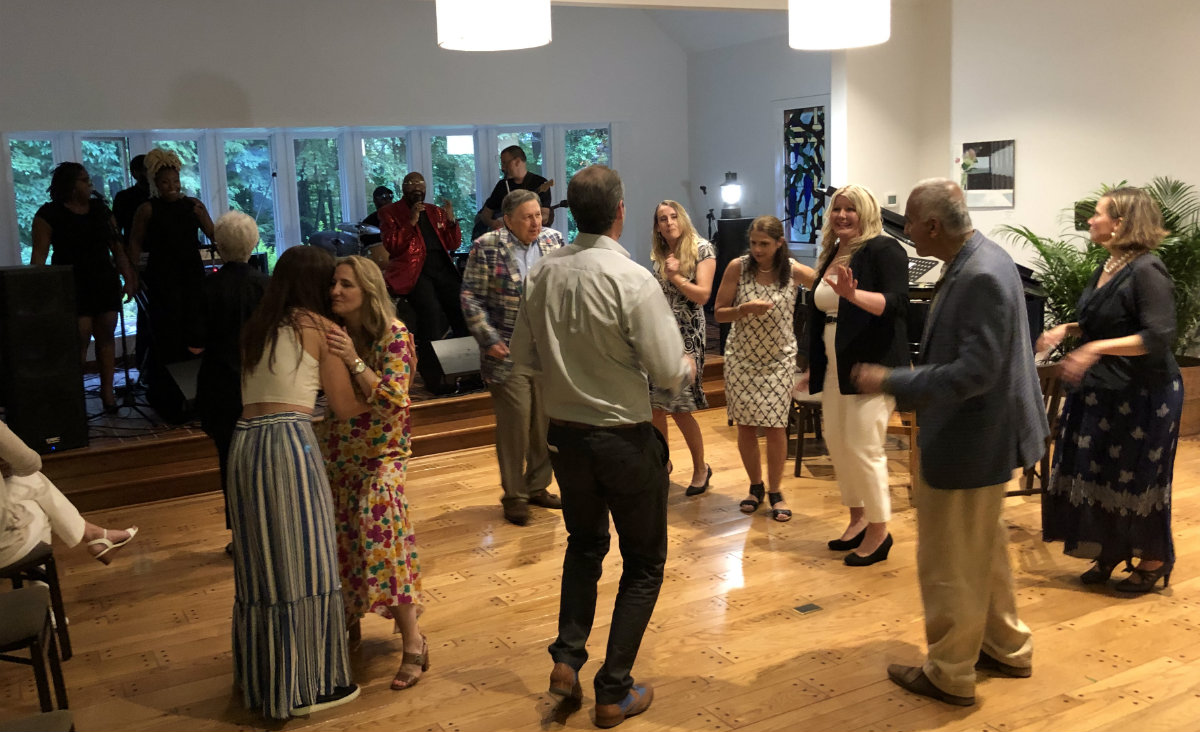 Lights back on, guests hit the dance floor. Lights back on, guests hit the dance floor.
