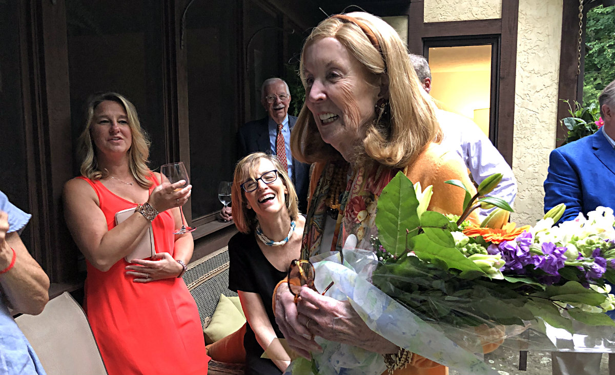 Jane Havermeyer receives flowers in appreciation for her funding of the Jane L. Havermeyer Fund for Client Financial Assistance. Jane Havermeyer receives flowers in appreciation for her funding of the Jane L. Havermeyer Fund for Client Financial Assistance.