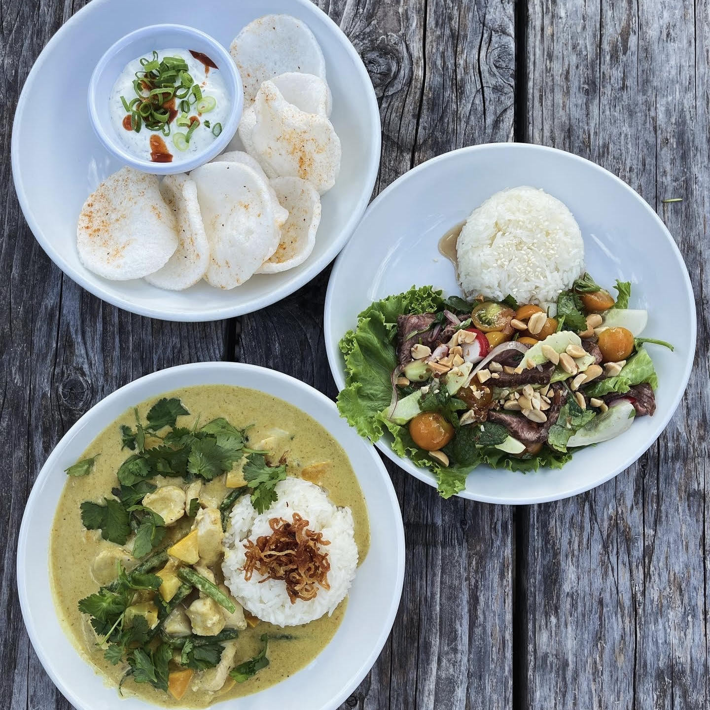 Sour cream and onion dip with old bay prawn chips, shaved beef salad with sticky rice, yellow fish curry with crispy shallots Sour cream and onion dip with old bay prawn chips, shaved beef salad with sticky rice, yellow fish curry with crispy shallots